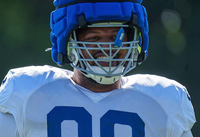 Indianapolis Colts defensive tackle Grover Stewart (90) smiles with teammates Monday, July 31, 2023, during training camp at the Grand Park Sports Campus in Westfield, Indiana.